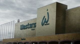 In front of a Western-style shop