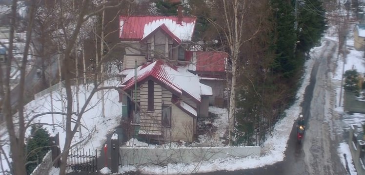 Snow-covered house front