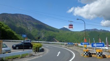In front of a mountain cable car station