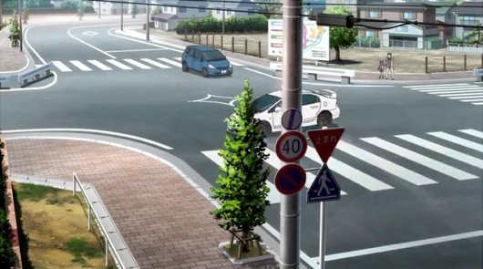 春太と千佳が車で通り過ぎる商店街