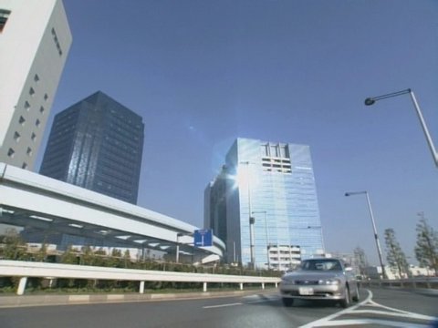 Curve beside a giant circular building