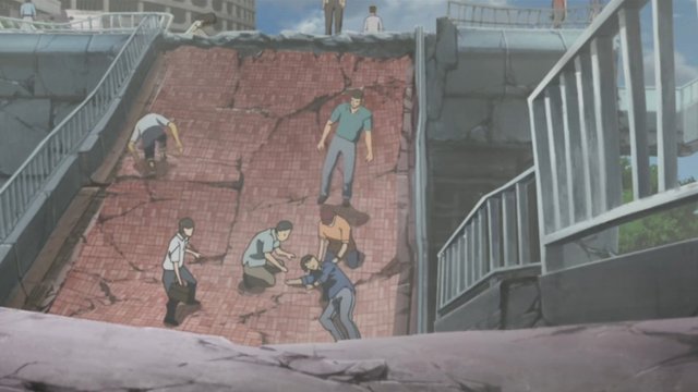 崩れた歩道橋と負傷者