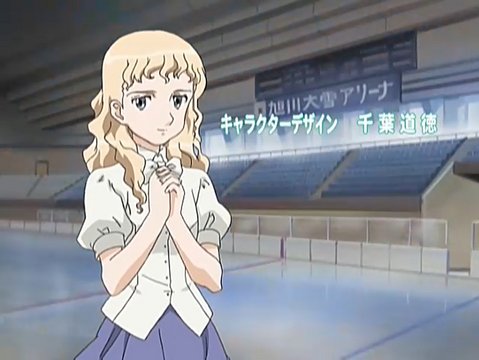 In front of a large arena