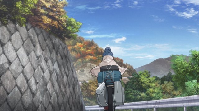 Nadeshiko cycling along the lakeside road
