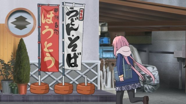 In front of the lakeside shop