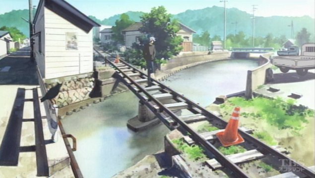 Misuzu walking on the tracks