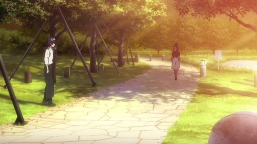 Cobblestone path in waterside park