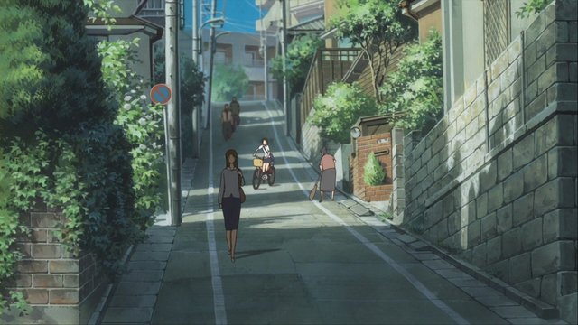 桜舞う坂道