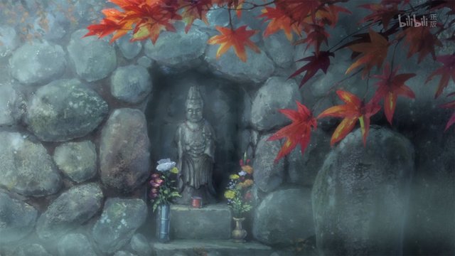 White Kannon statue on a hill
