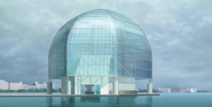 In front of the giant aquarium tank