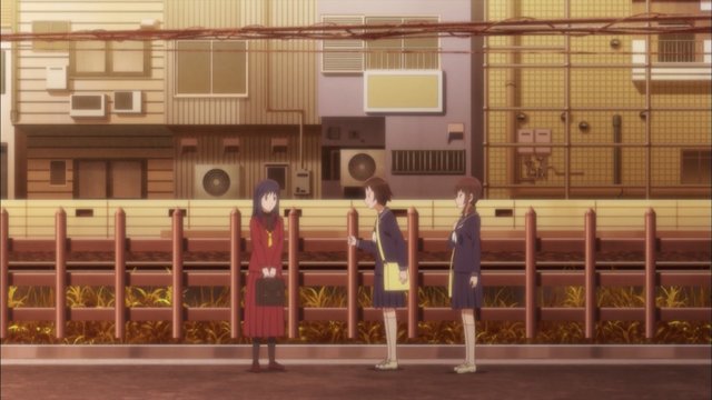 After-school chat in front of the station
