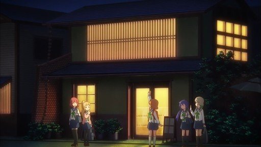 In front of the bakery with round bread