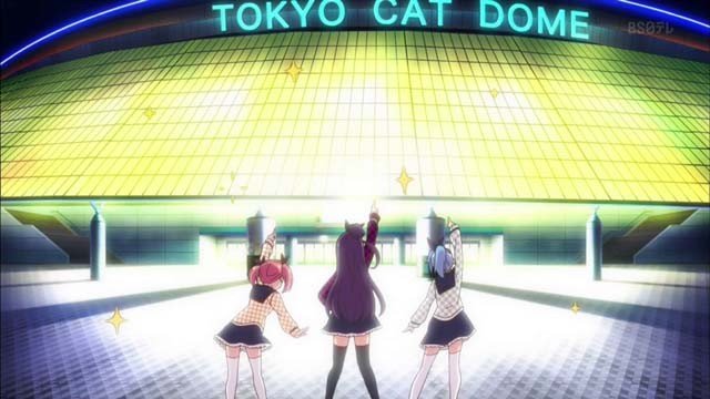 In front of a large dome stadium