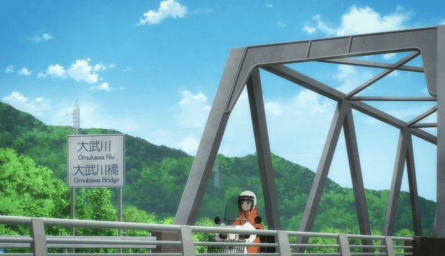Red steel bridge with snowscape