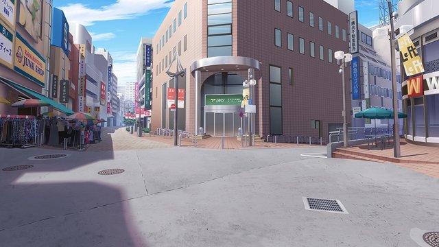 Clock tower and pedestrians in front of the station