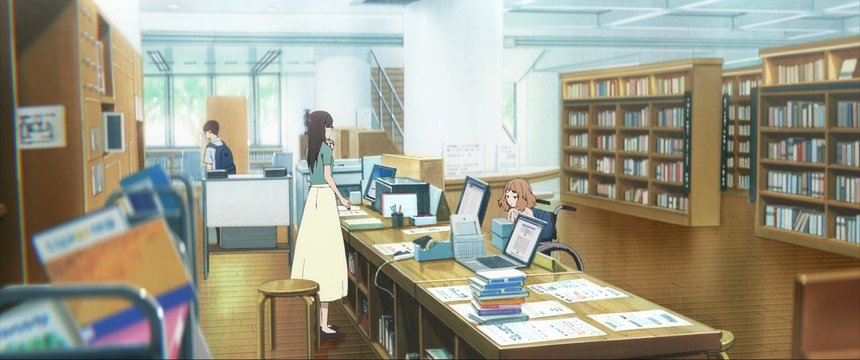 Girl in wheelchair at the library