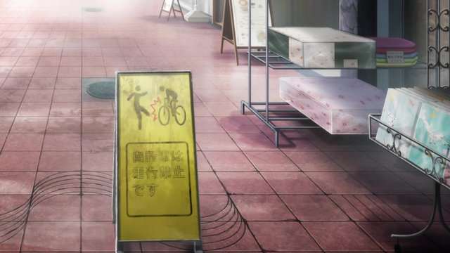 No Bicycles sign at night