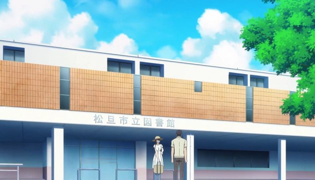 書架の間でのメモのやりとり