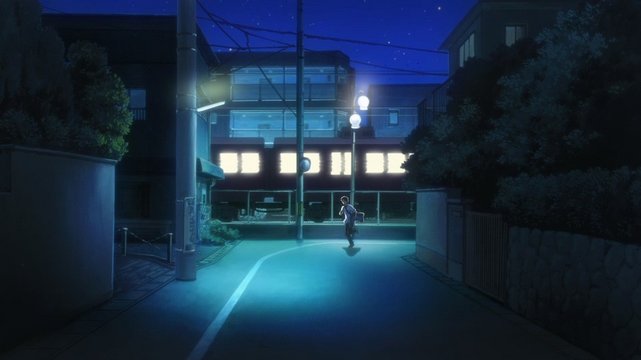 Kyon running in front of a park
