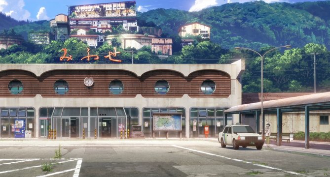 古い駅舎の前
