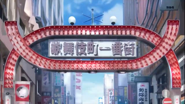 Neon arch at the entrance of a bustling street
