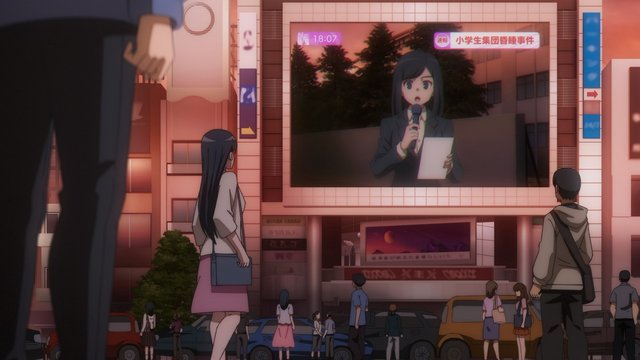 Crossroads with giant electronic billboard building