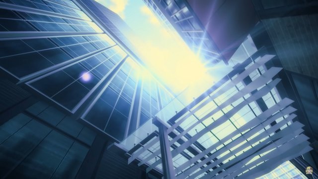 Pedestrian crossing in front of a high-rise glass tower