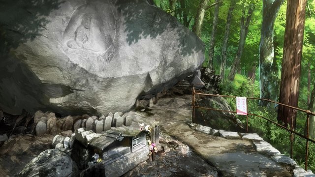 A large rock and river view