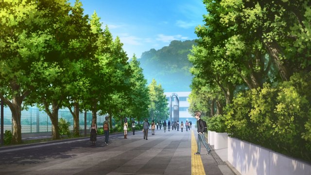Campus slope with school buildings in distance