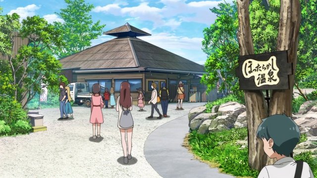 Open-air hot spring with distant Mount Fuji
