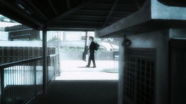 Kyon passes by a Jizō statue