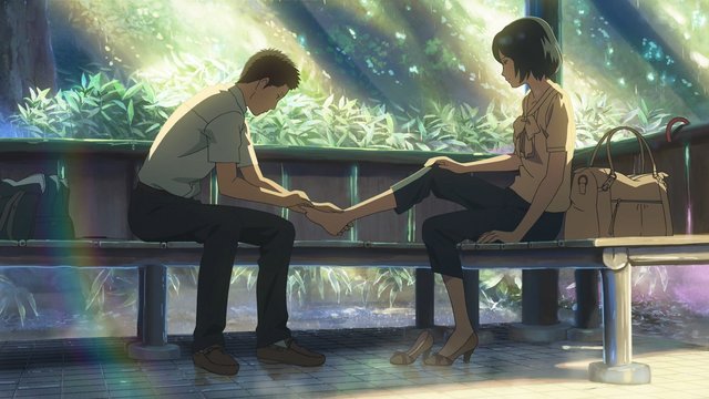 Rainy conversation in a park pavilion