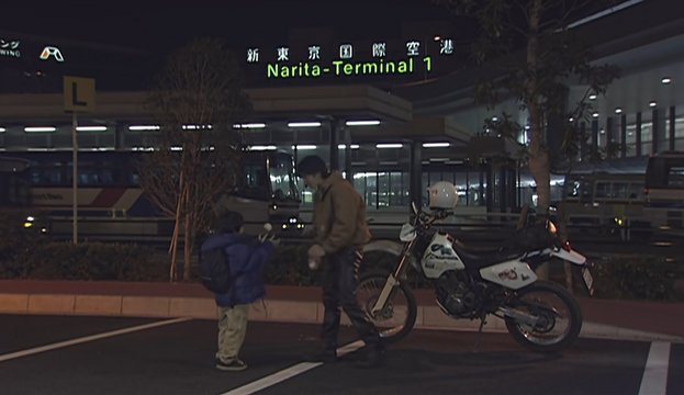 Airport exit cheering up a child