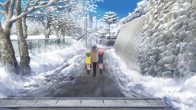Road next to a small park on the way to school