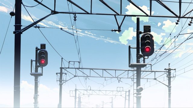 Railroad crossing with cherry blossoms