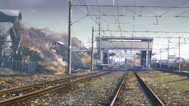 Snow-covered railway and station